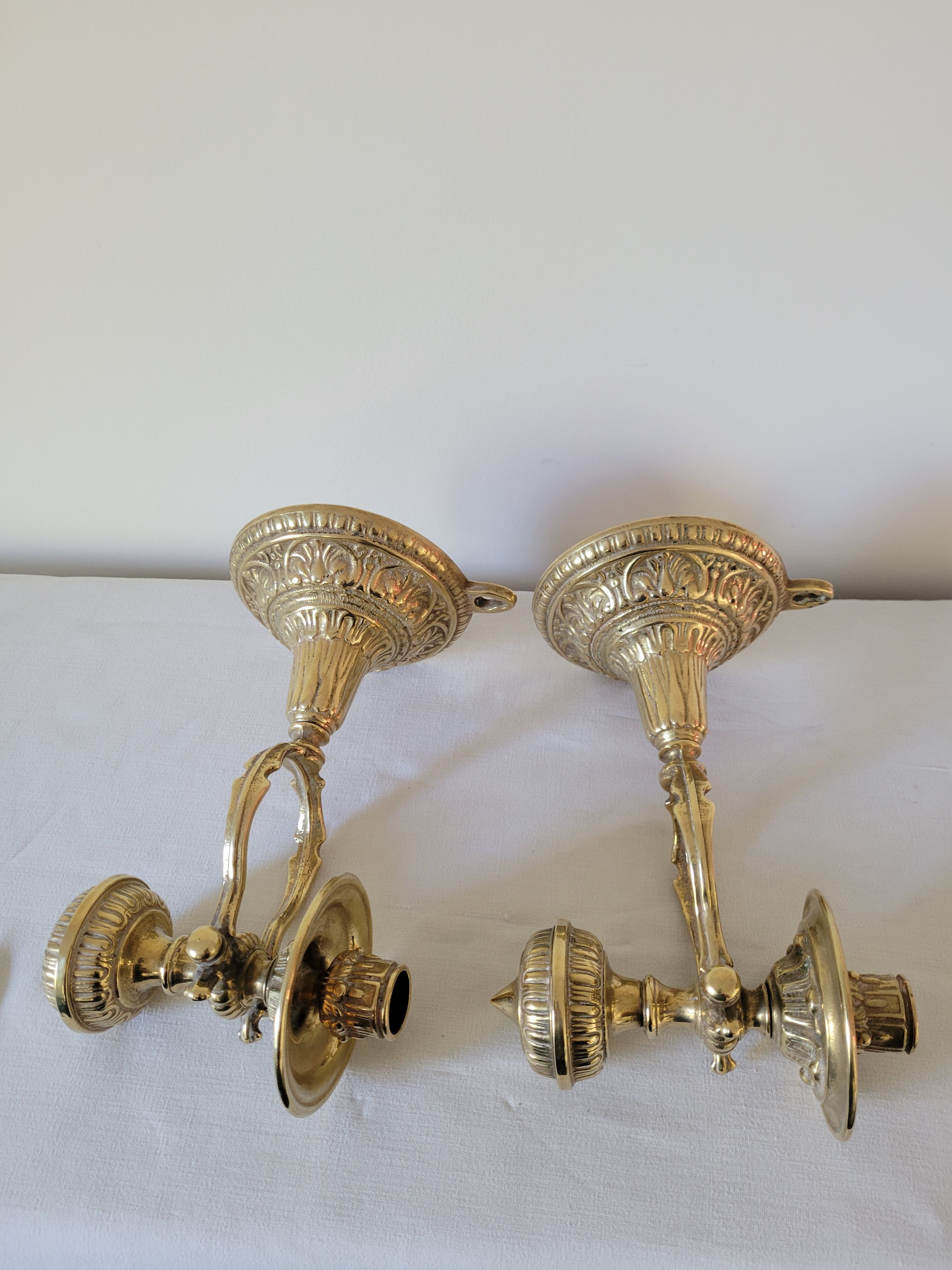 Duo of brass balance wall candle holders