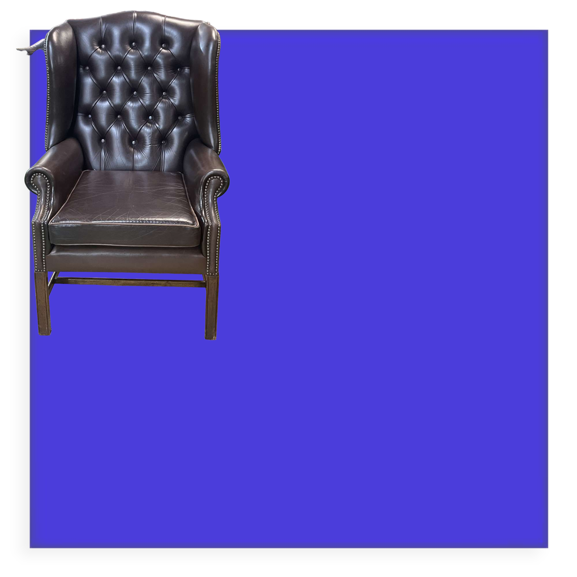 Chesterfield armchair with brown leather ears from the 1990s in very good condition