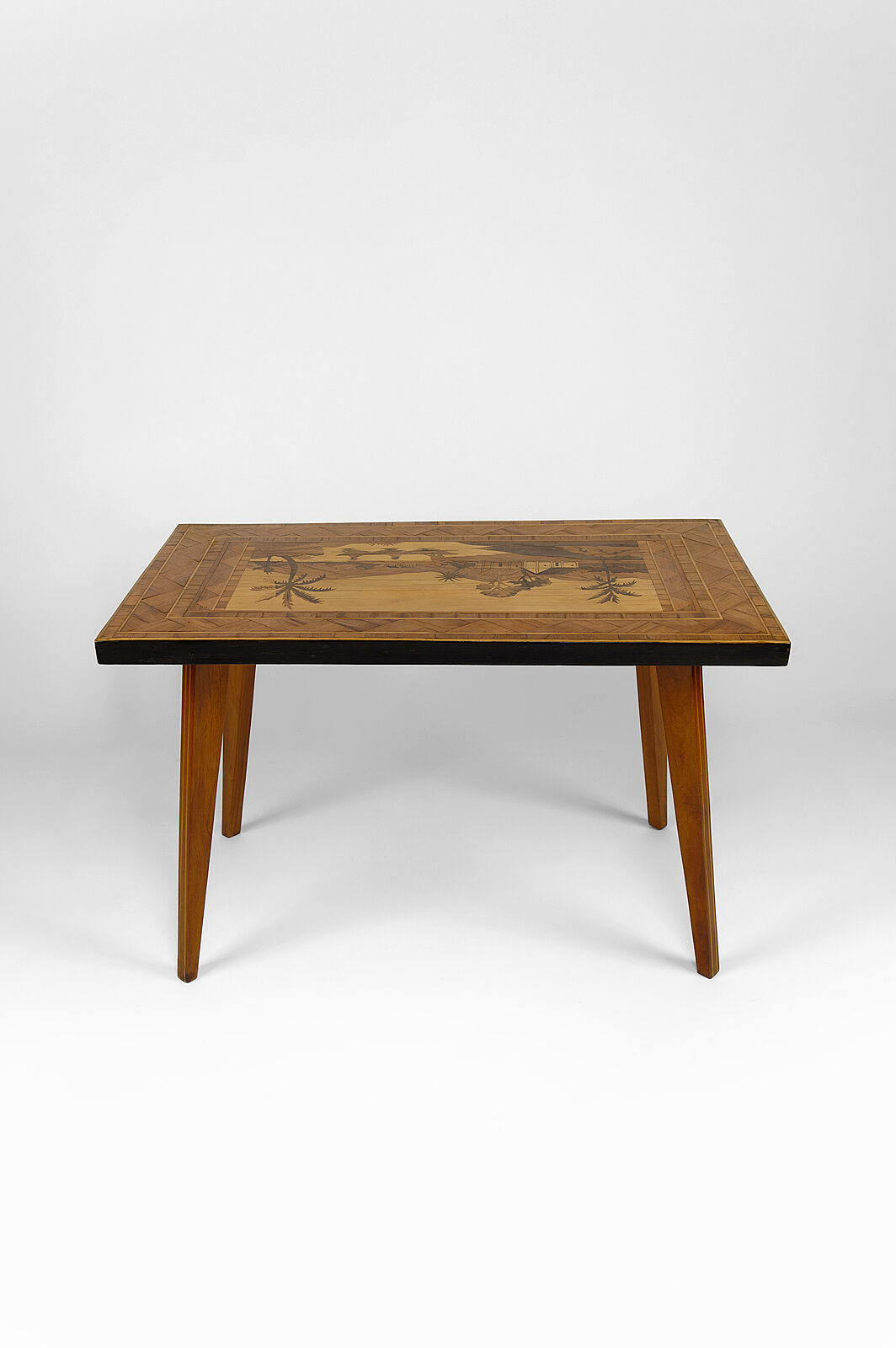 African Midcentury coffee table in inlaid wood, circa 1960