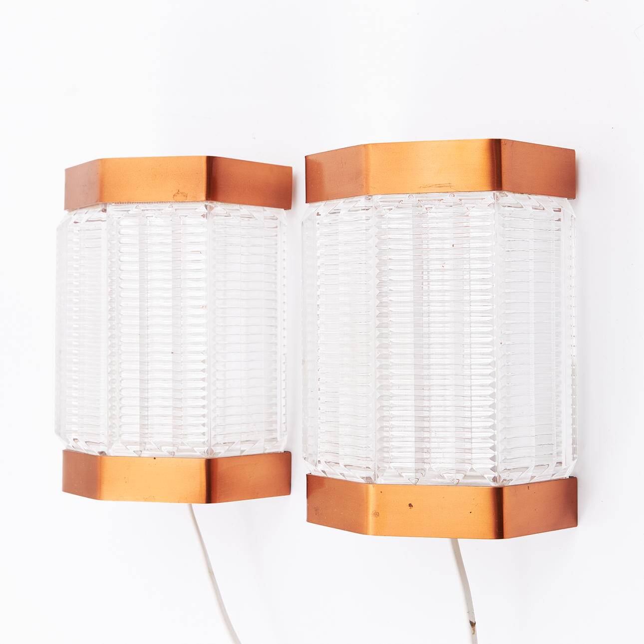 Scandinavian wall lights in copper and pressed glass