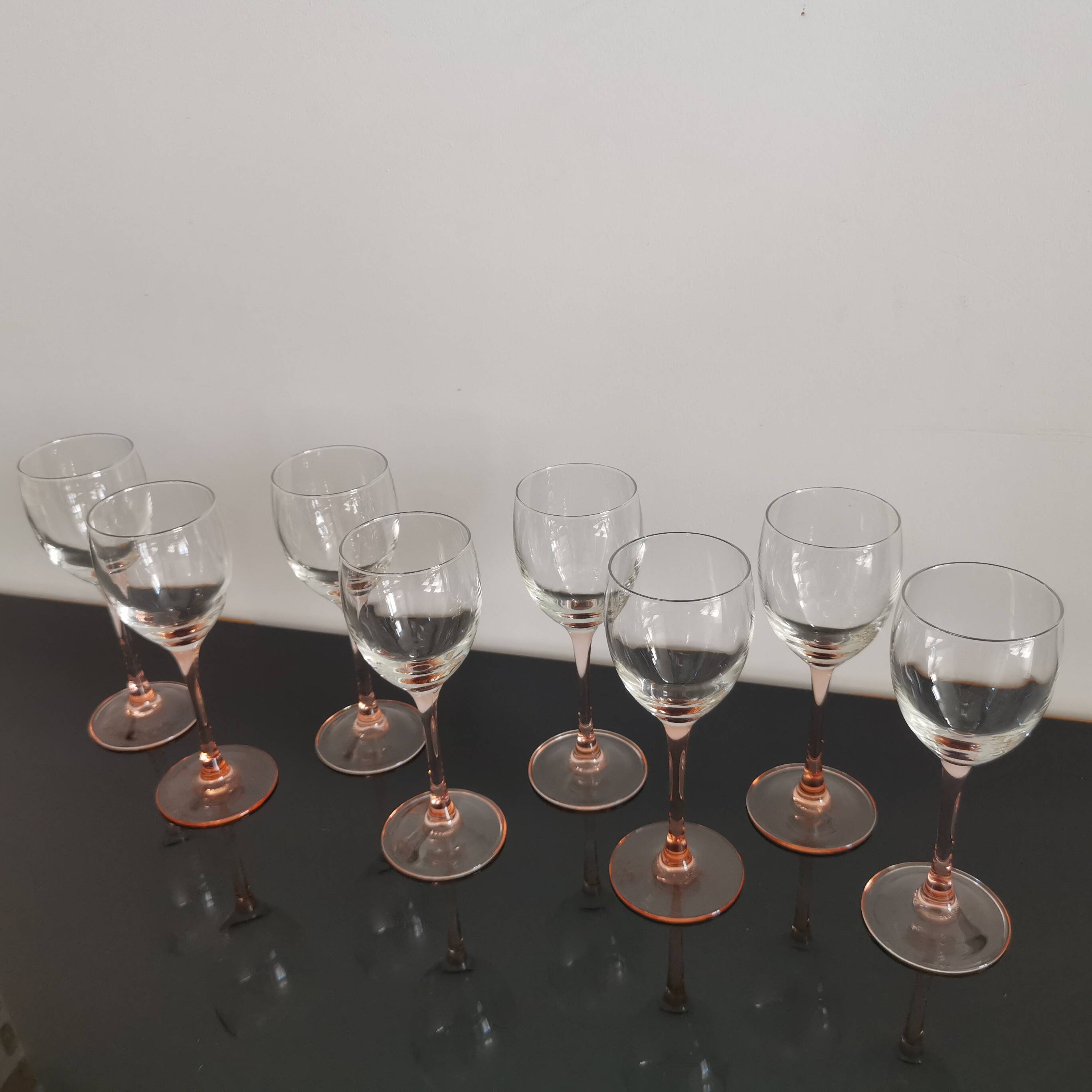 4 Luminarc white wine glasses with pink feet