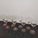 4 Luminarc white wine glasses with pink feet