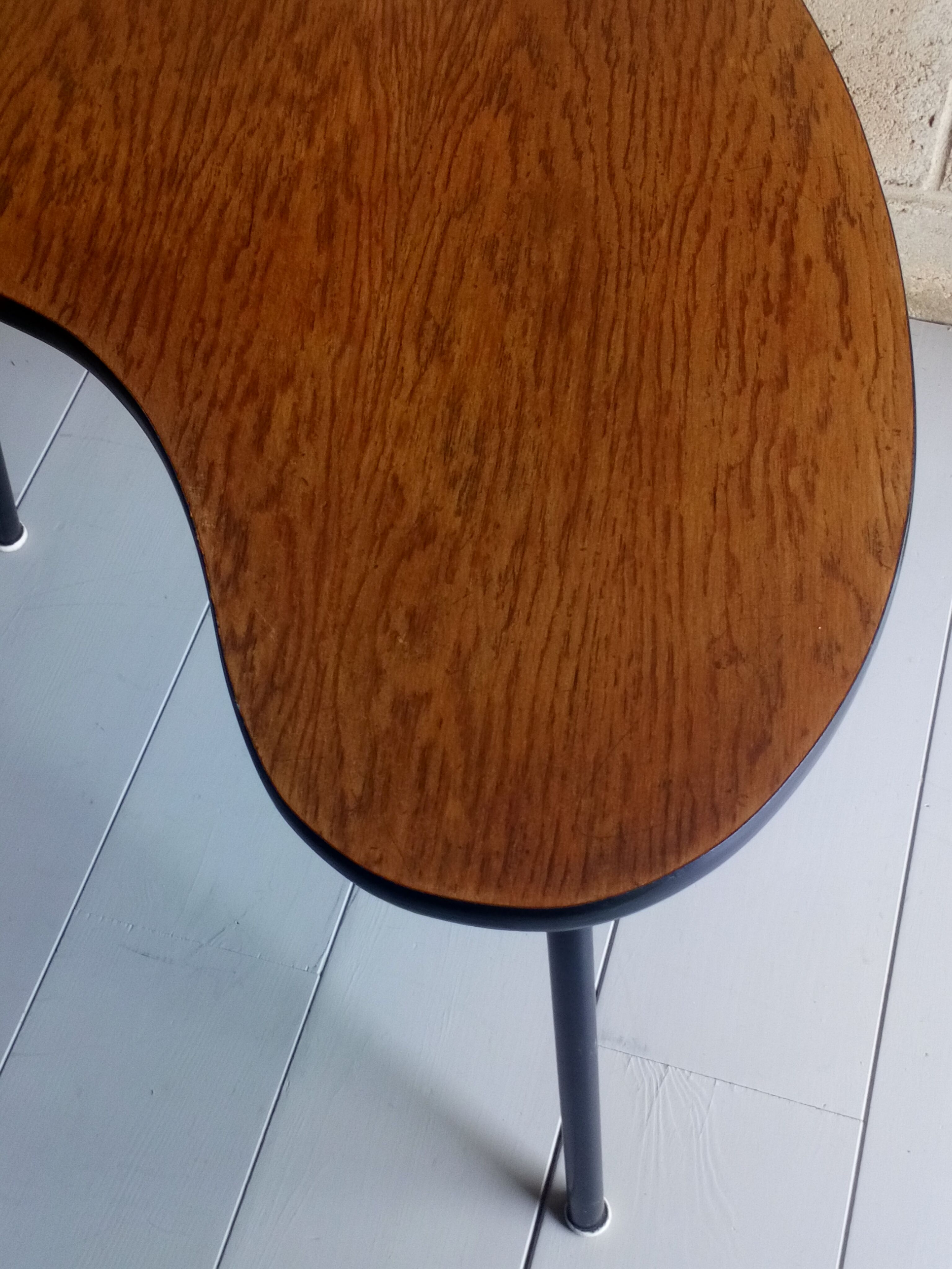 Scandinavian side table shaped bean with three feet