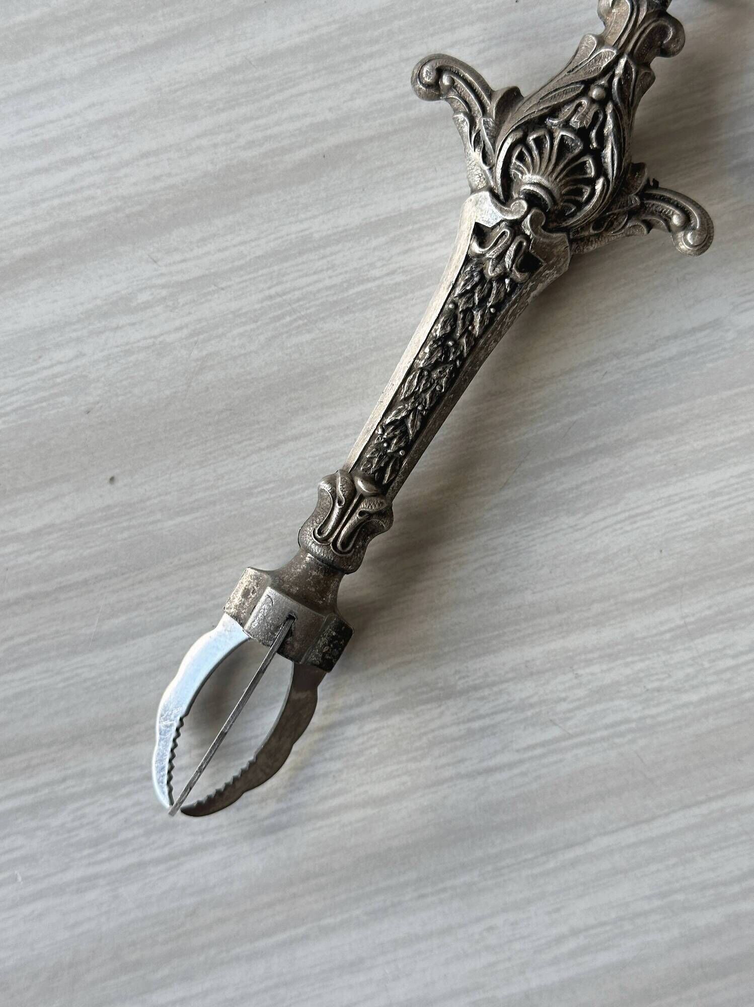 Antique metal sugar tongs