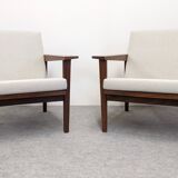 Pair of Scandinavian style armchairs in teak, France circa 1950.