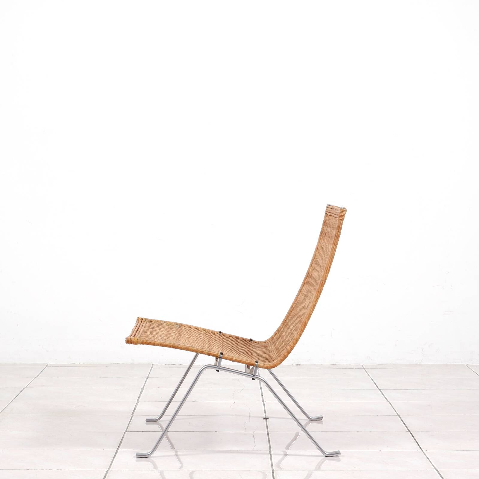 PK 22“ lounge chair in rattan by Poul Kjaerholm for E. Kold Christensen