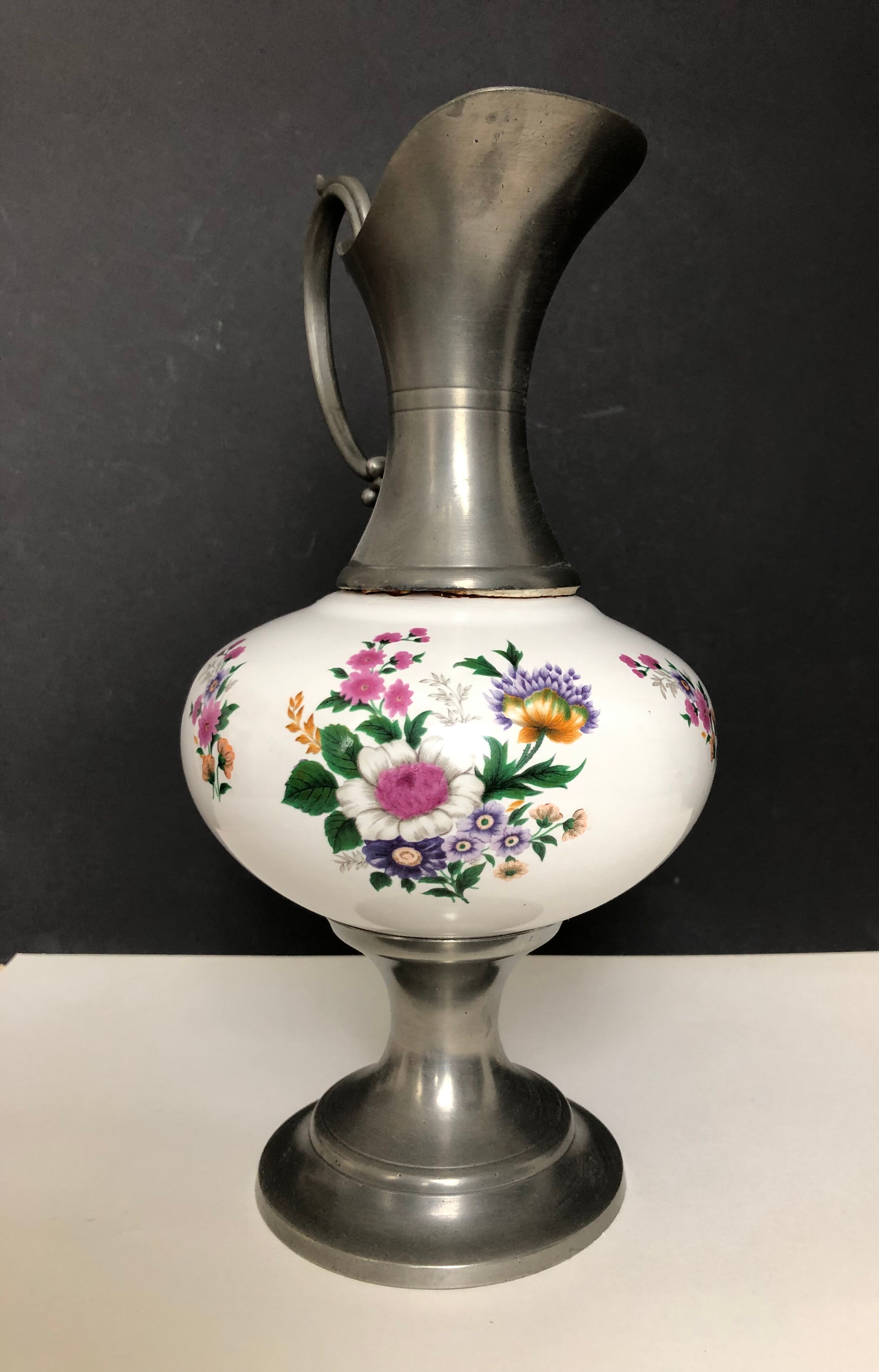 Ceramic and tin pitcher