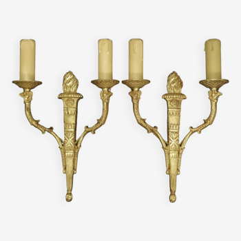 Pair of sconces with griffin heads from the 19th century Empire style - bronze
