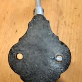 Enamelled cast iron coat hook