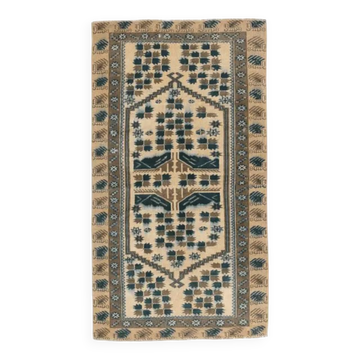 Tapis turc vintage noué à la main 95x172