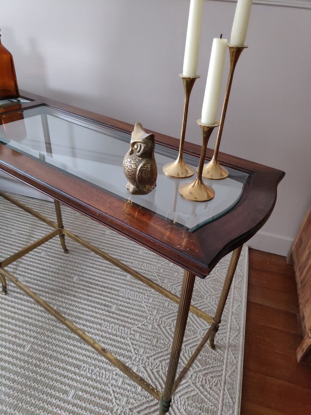 Glass and brass console table