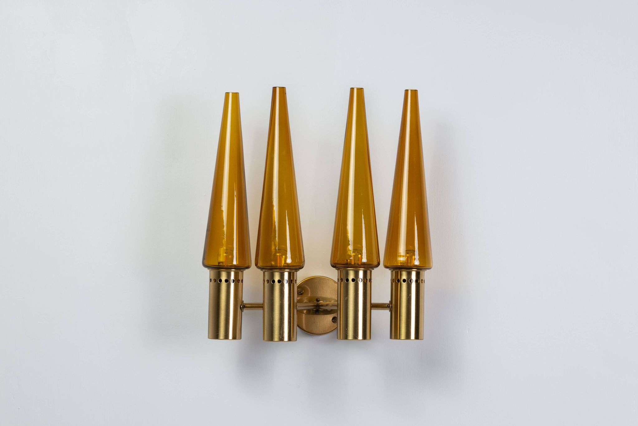 Hans Agne Jakobsson wall lamp made from brass with orange shades