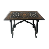 Blackened wood display table with marquetry top, Spain, 19th century.