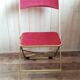 Pink velvet folding chair