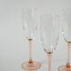 Set of 4 champagne flutes with pink feet, 1970