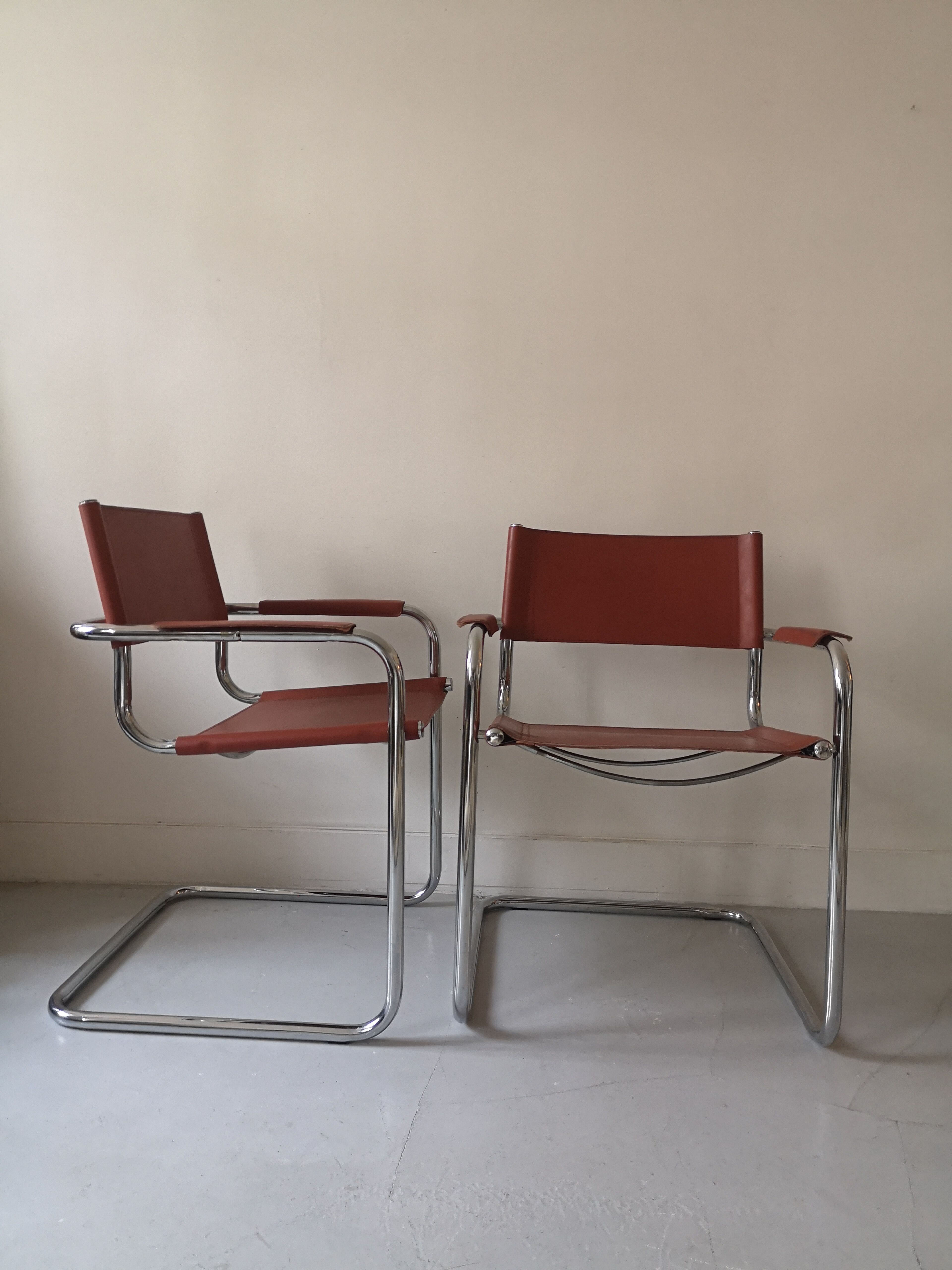 pair of tibular chairs design metal and leather, 1970