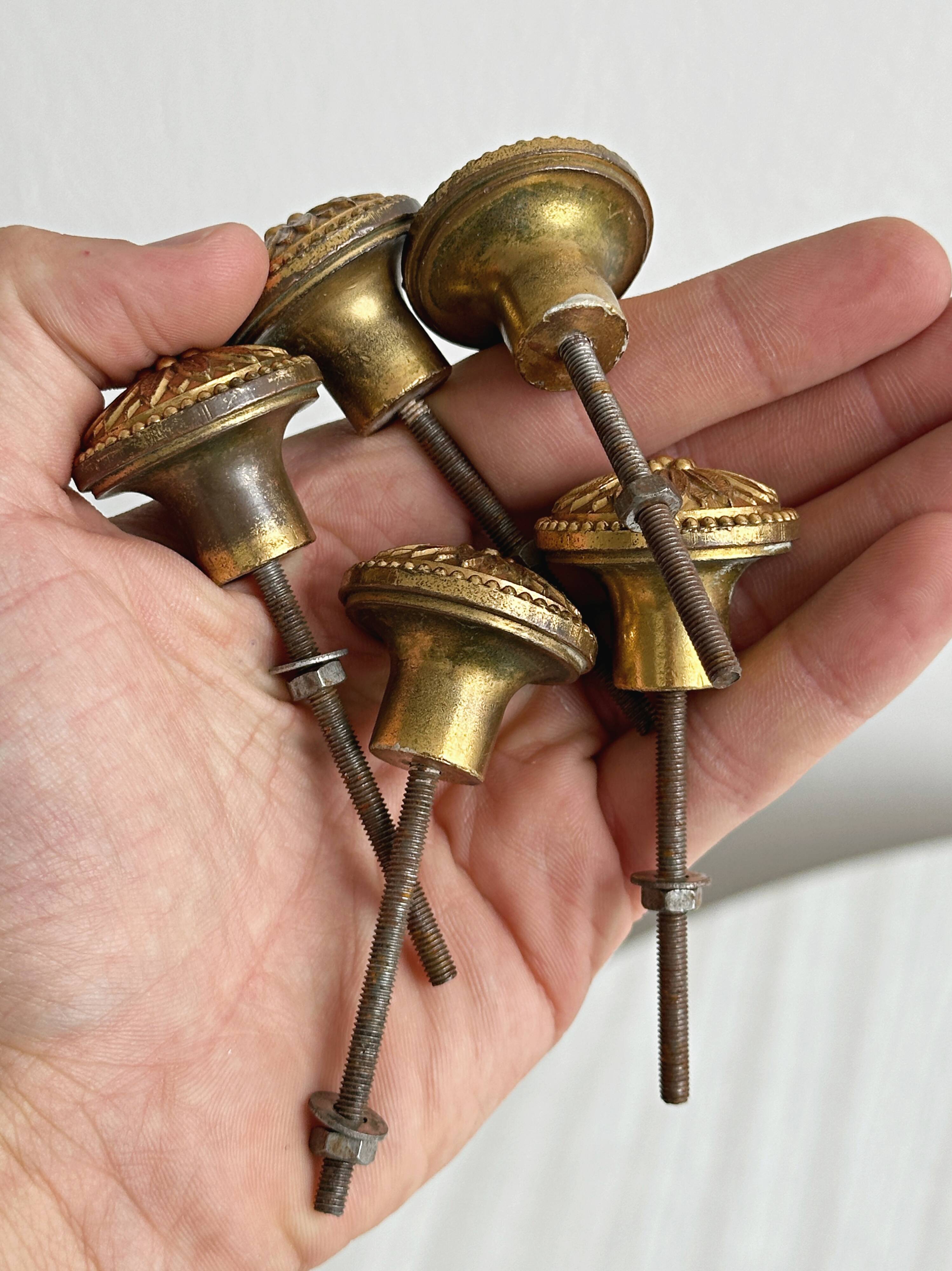 Set of 5 antique brass furniture knobs