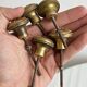 Set of 5 antique brass furniture knobs