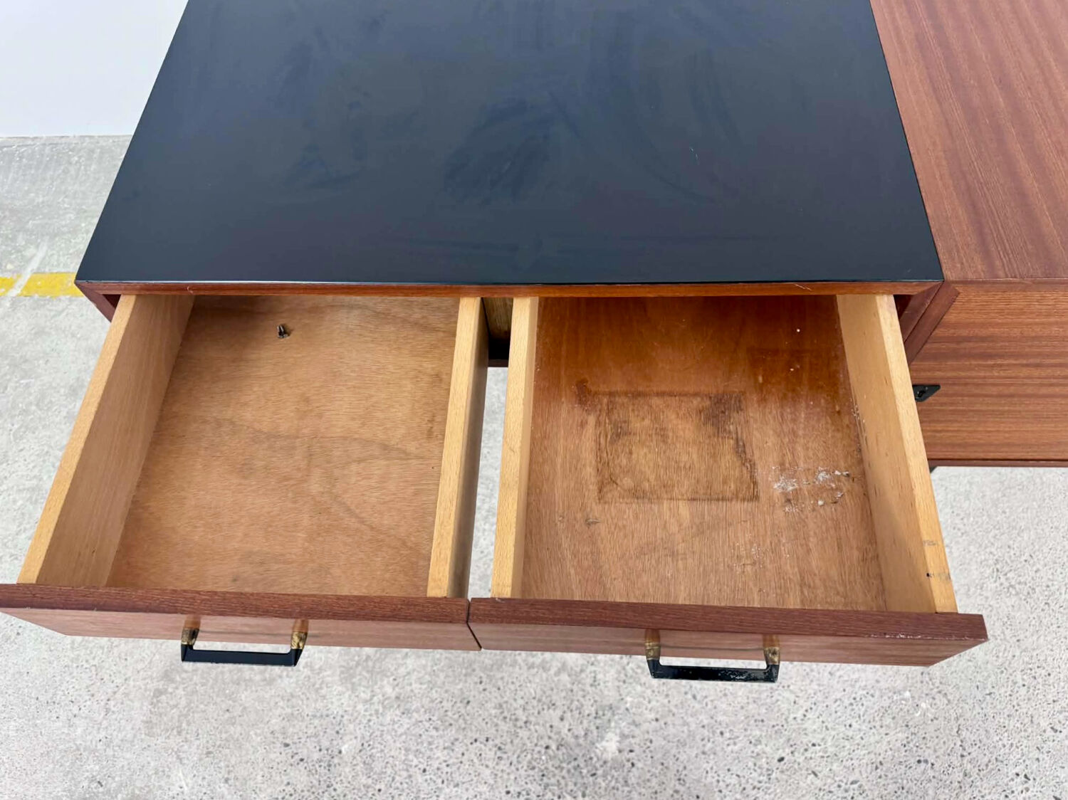 French modernist desk from the 1950s with 2 drawers, 1 cabinet, and 1 container.