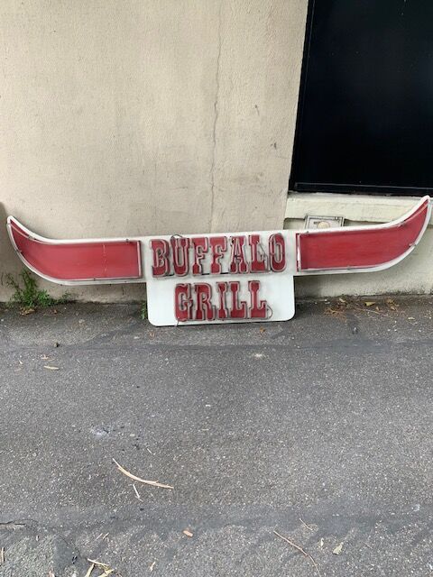 Buffalo Grill sign plate with neon