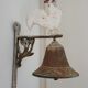 Cloche de porte en fonte