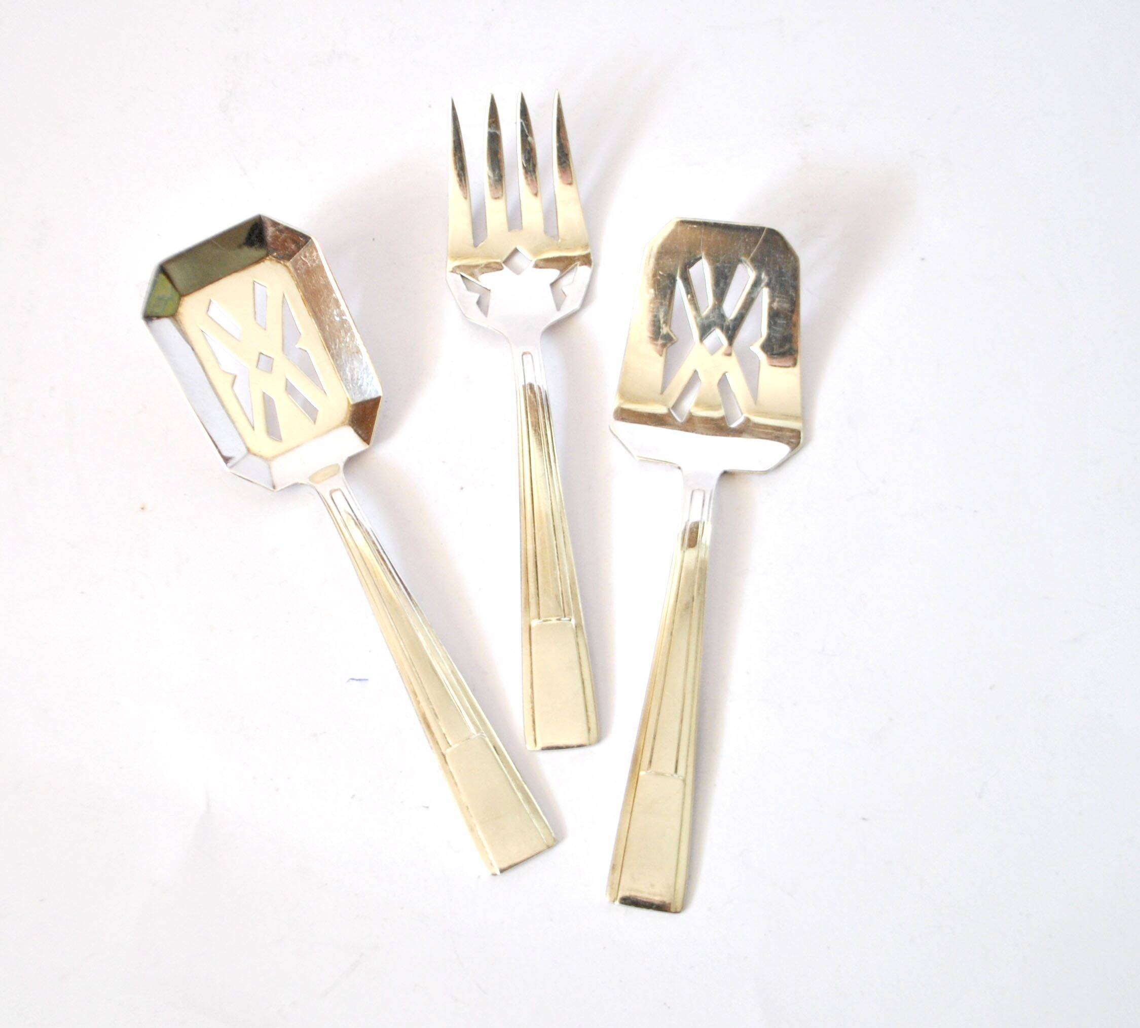 Set of 3 modernist 1950s dessert cutlery in silver by RENEKA.