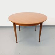 Round dining table in vintage Scandinavian style from the 50s and 60s in teak.