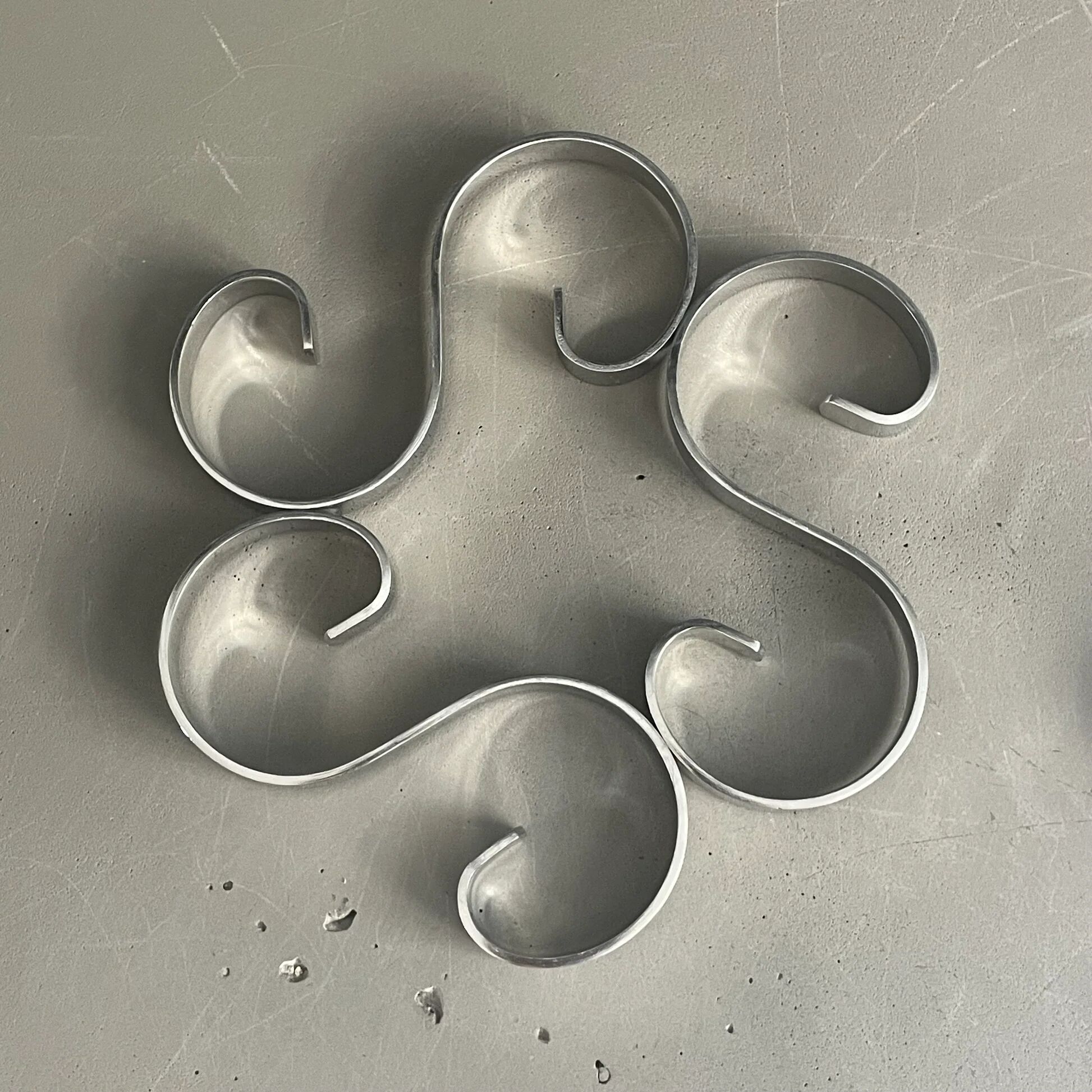 Pair of stainless steel trivets