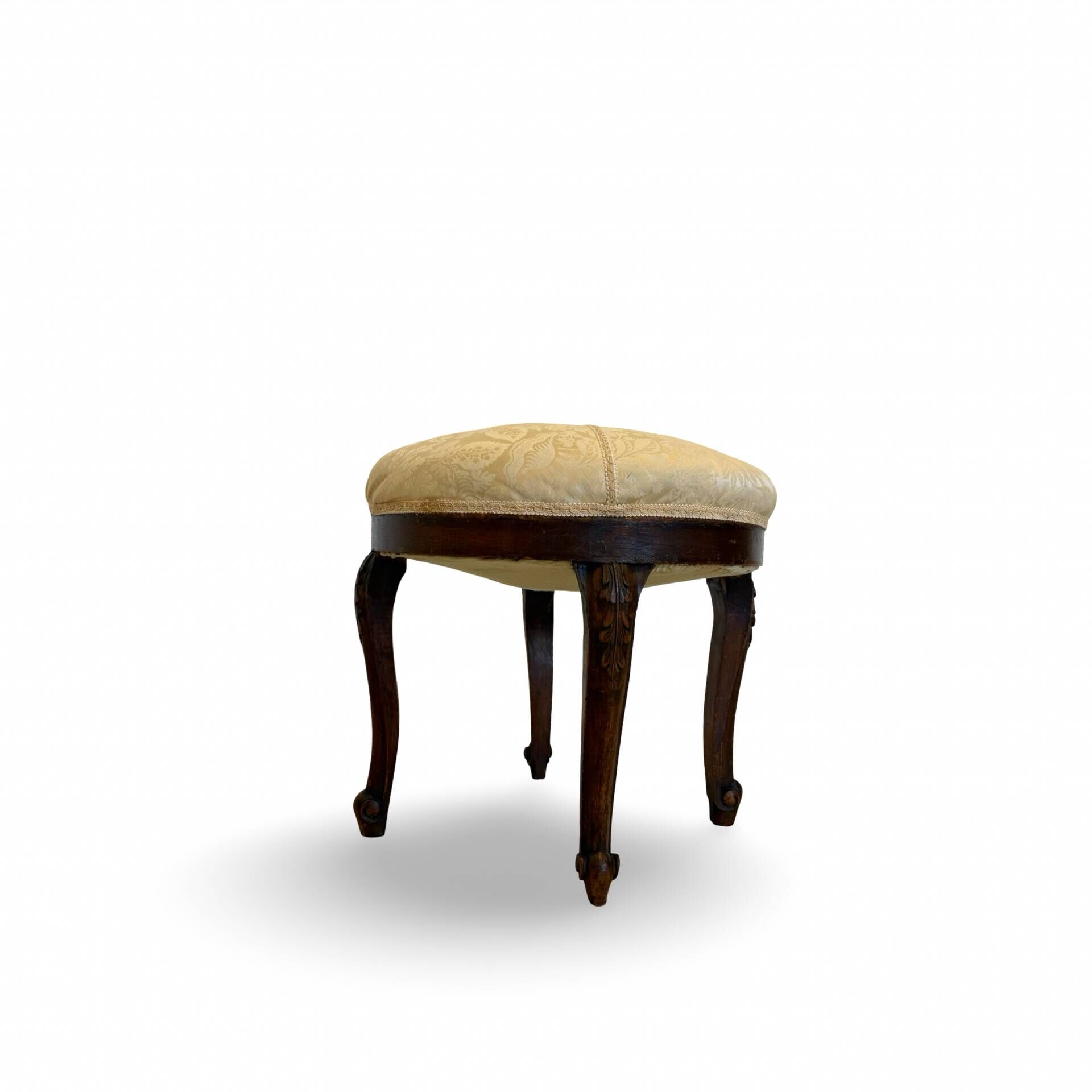 An antique Italian bar chair and a matching tufted vanity stool.