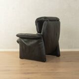 1980s cor armchair and ottoman in black leather