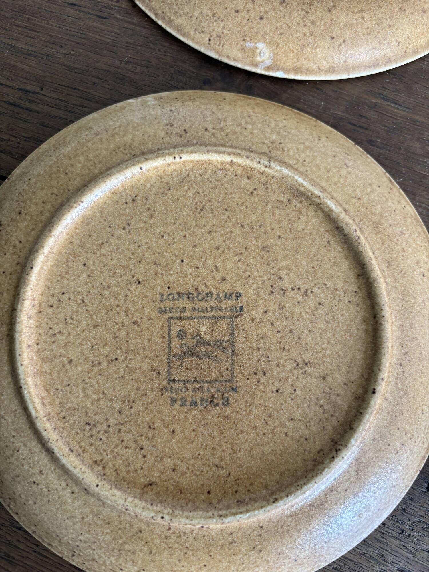 Service of 15 vintage Longchamp plates in stoneware.