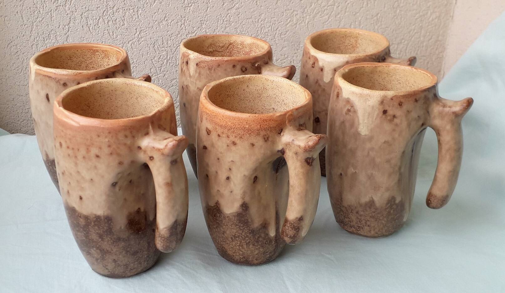 6 ceramic mugs or tankards