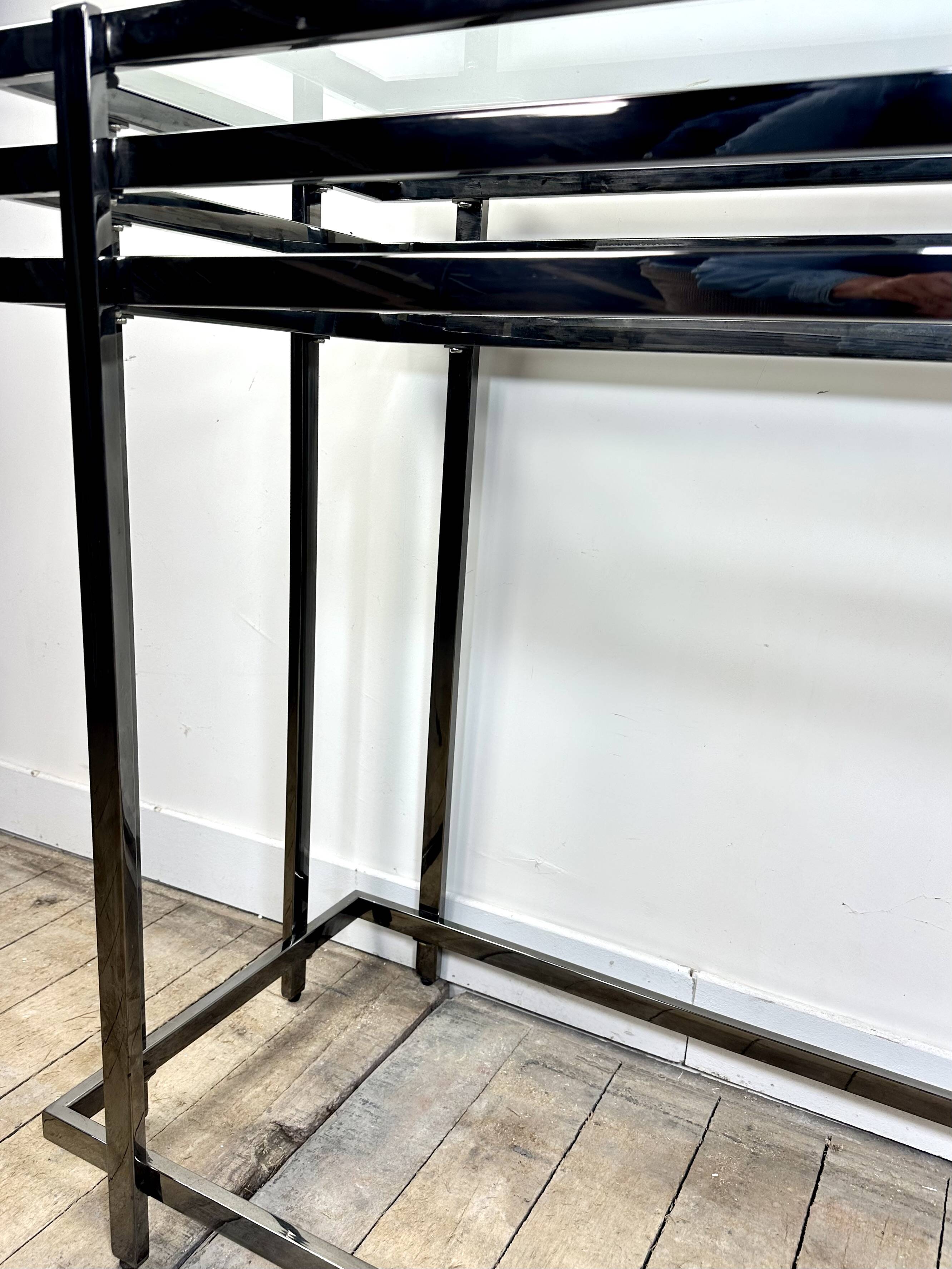 Smoked silver metal console from the 2000s.