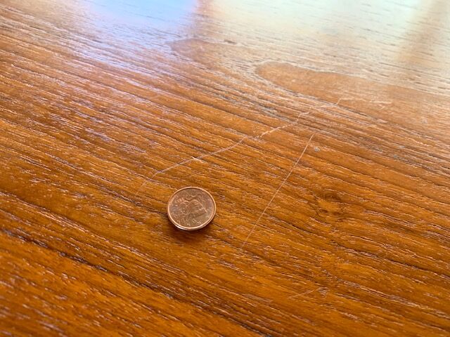 Expandable teak dining table, butterfly extension, circa 60s