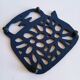 Kettle-shaped cast iron trivet
