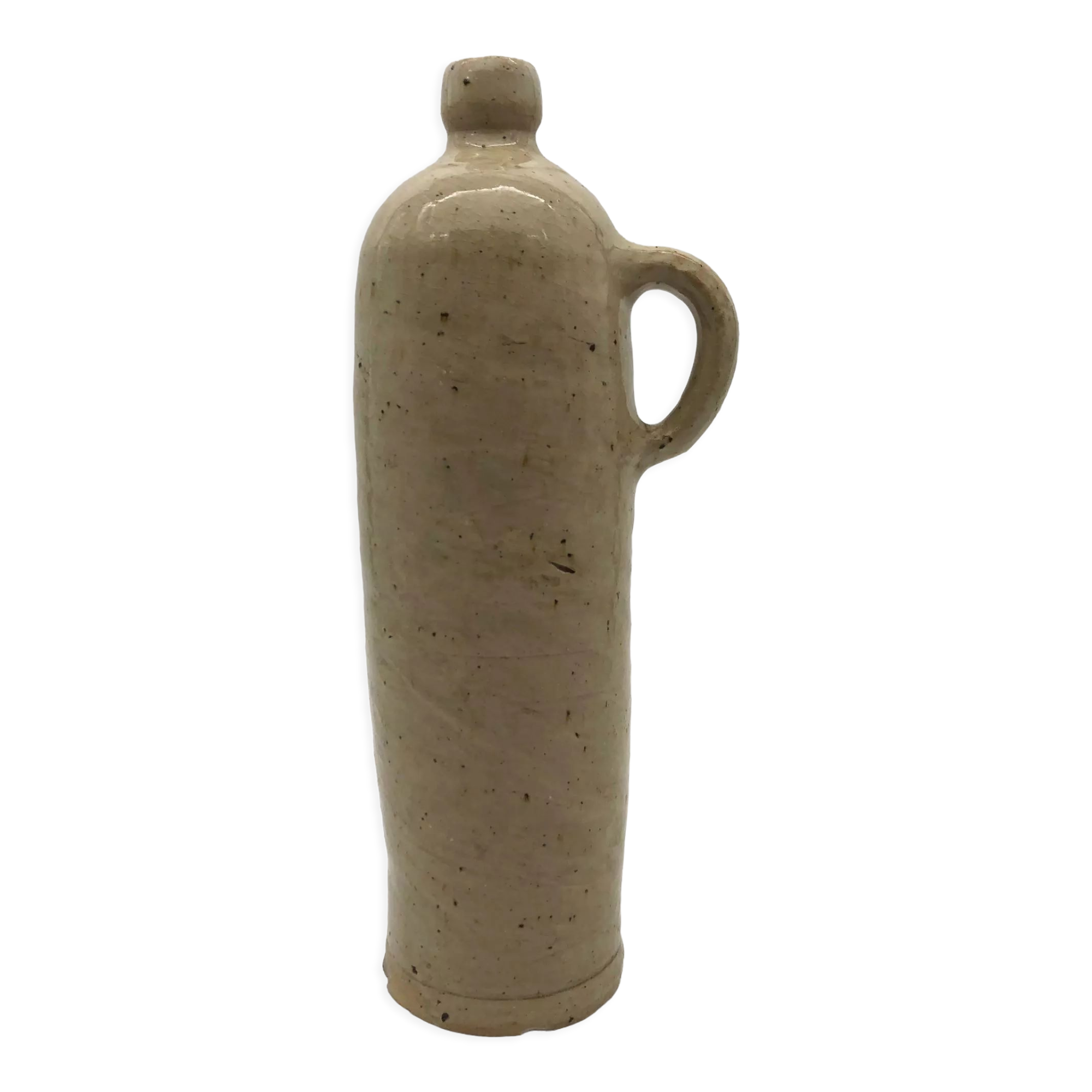 Old hot water bottle in glazed stoneware, beige color