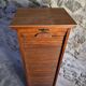 French antique wardrobe with curtain in oak, circa 1920–1930.