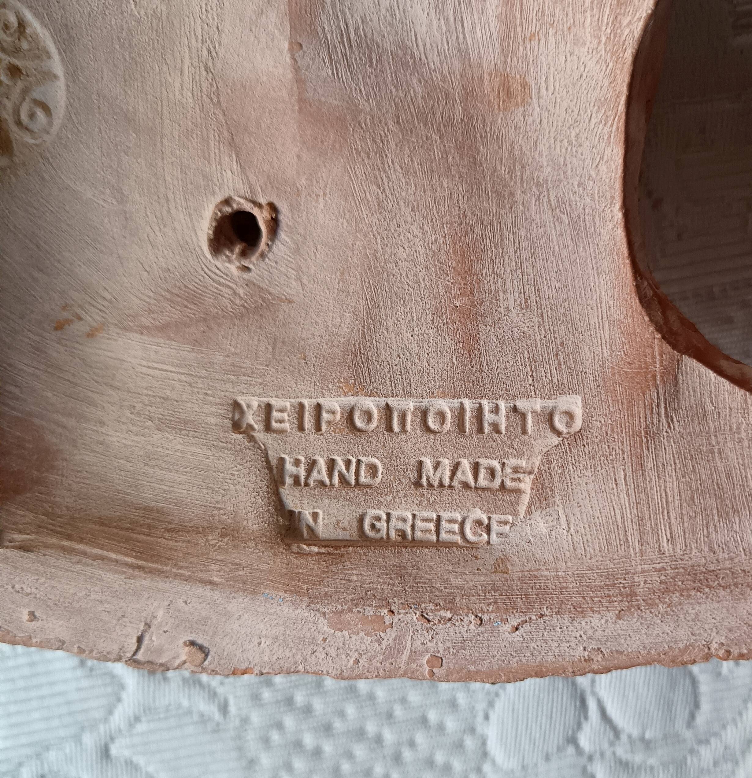 2 vintage terracotta masks made in Greece