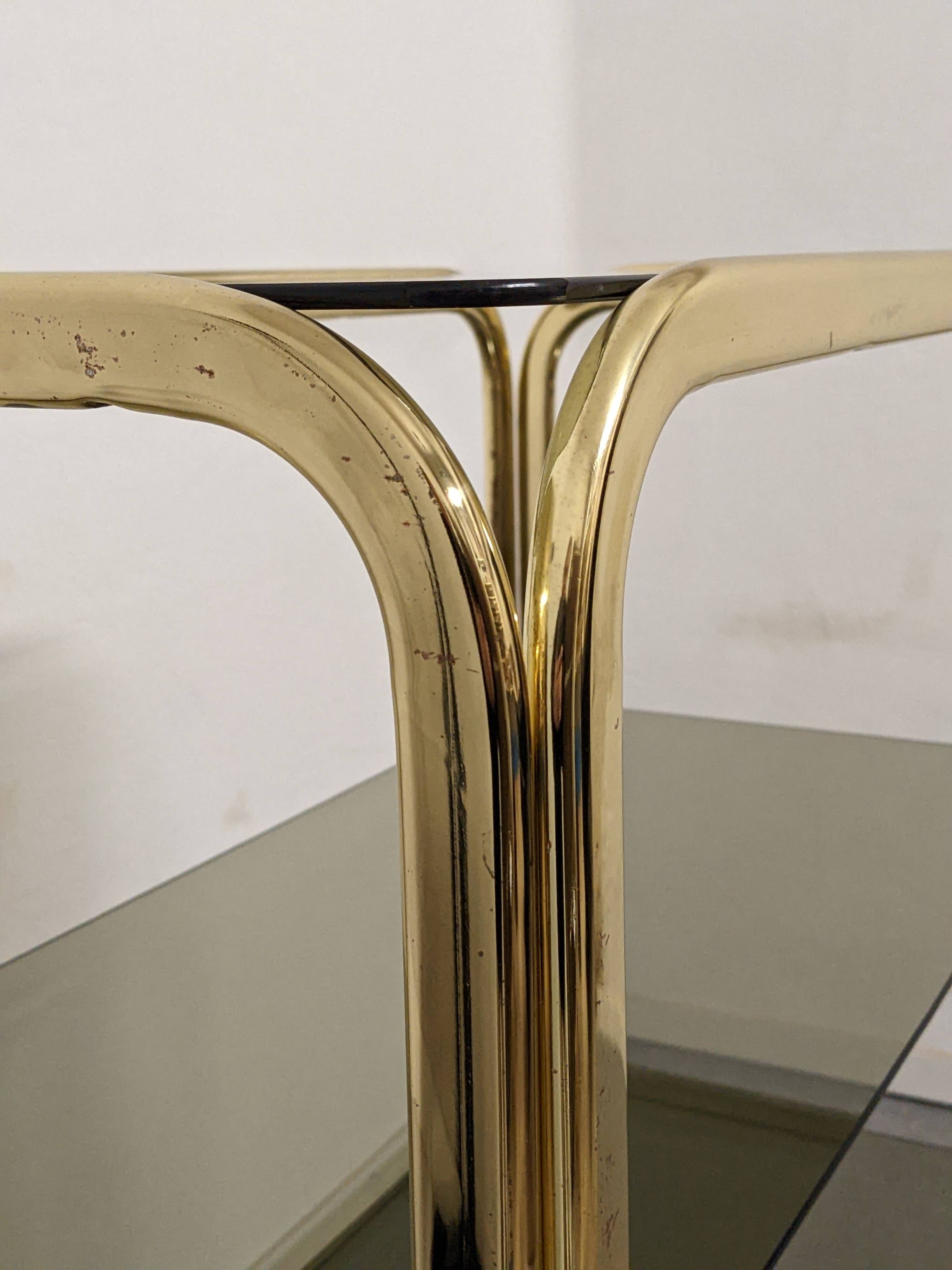 Hollywood Regency gilt metal and smoked glass shelf, Italy circa 1970