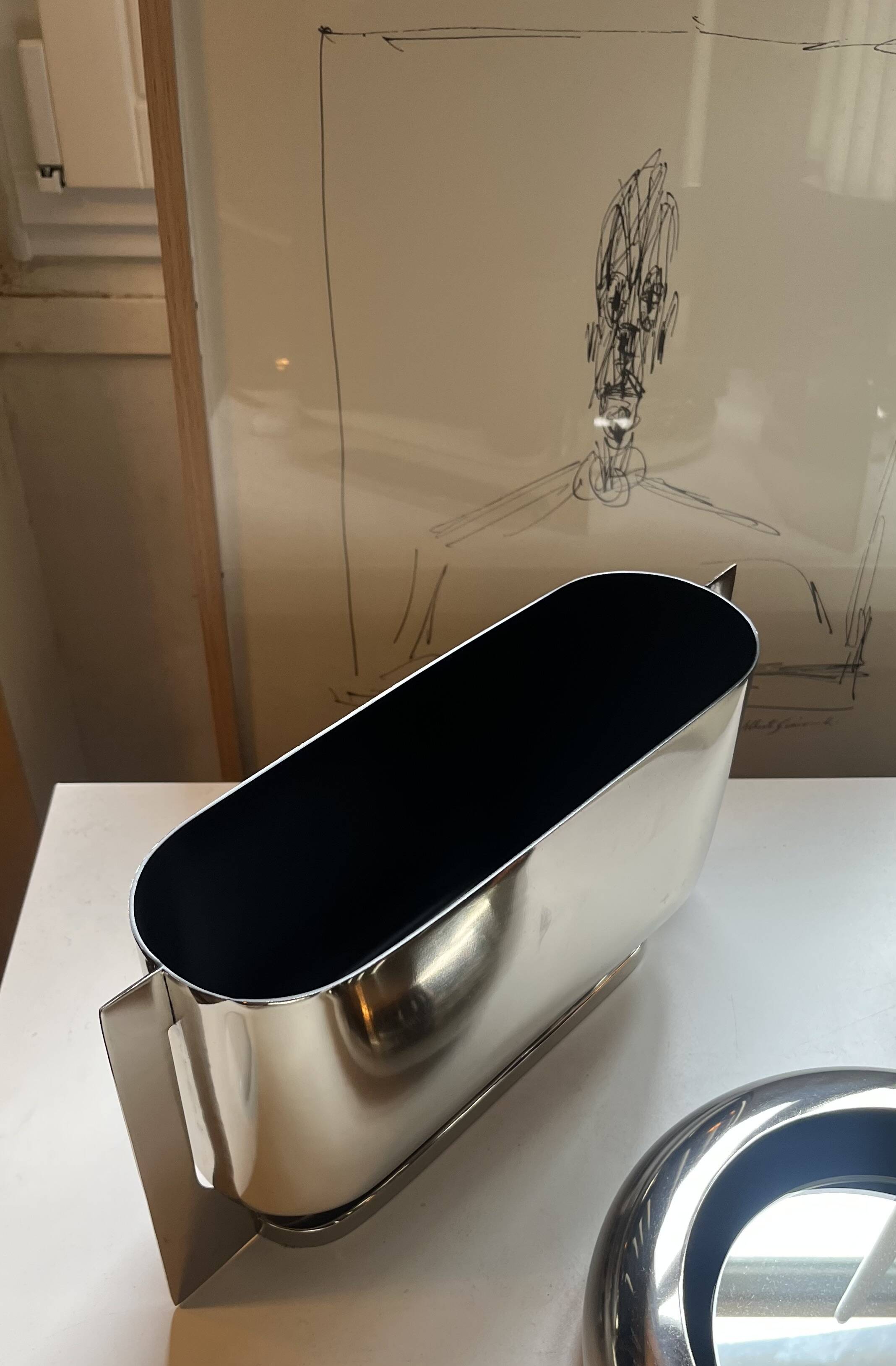 Horizontal vase in silver chrome metal by Jean-Baptiste Fastrez