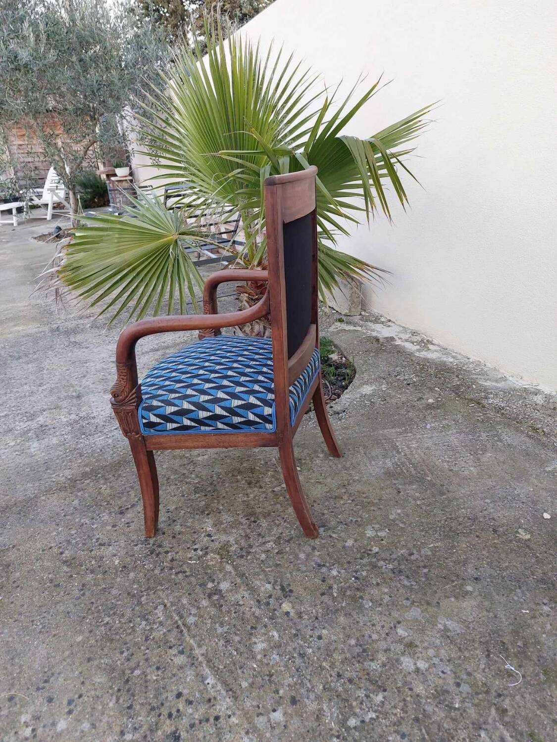 Reupholstered Empire style armchair