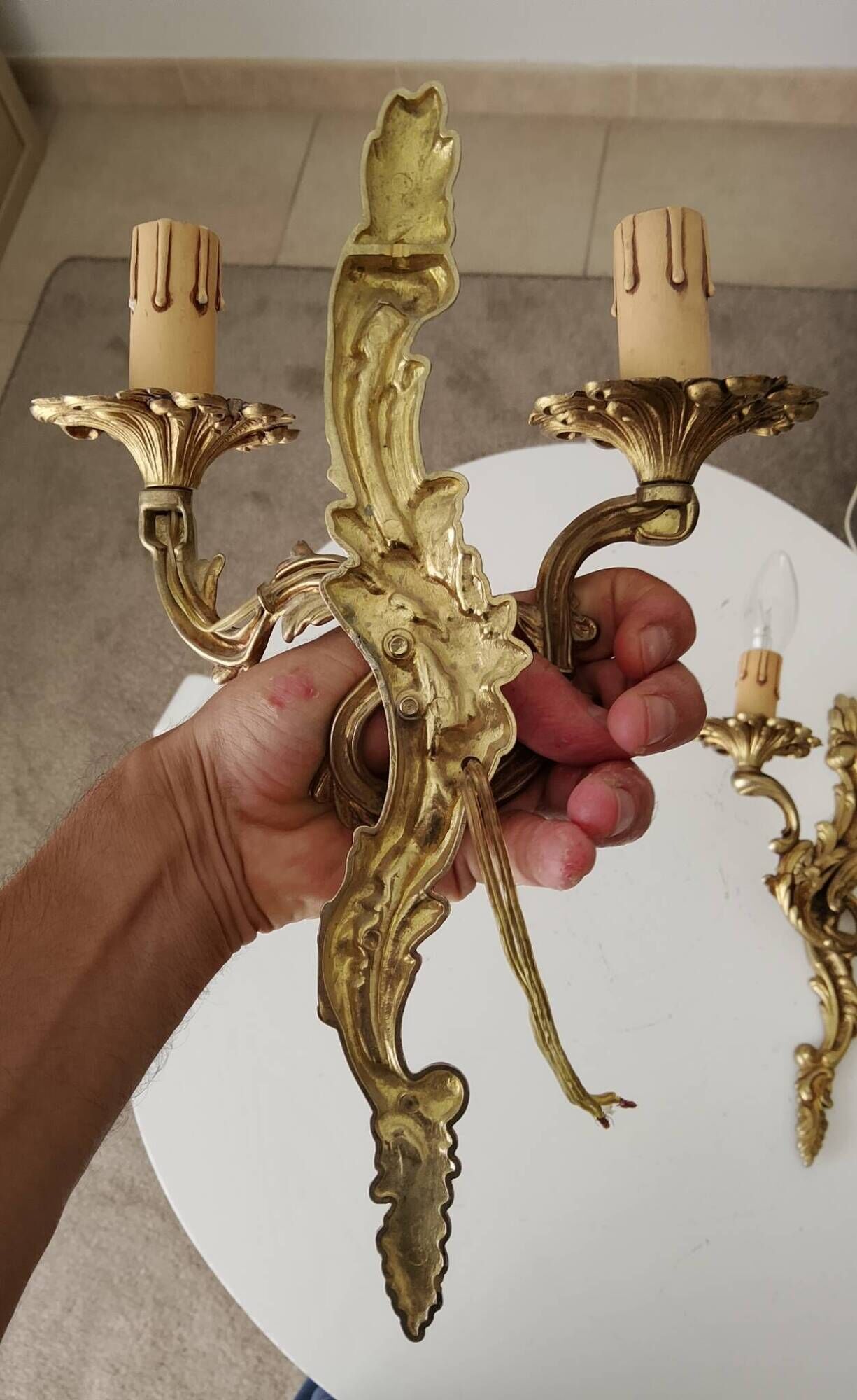 Pair of antique Rococo wall sconces in Louis XV style.