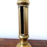 Bougeoir poussoir en laiton, xixème siècle