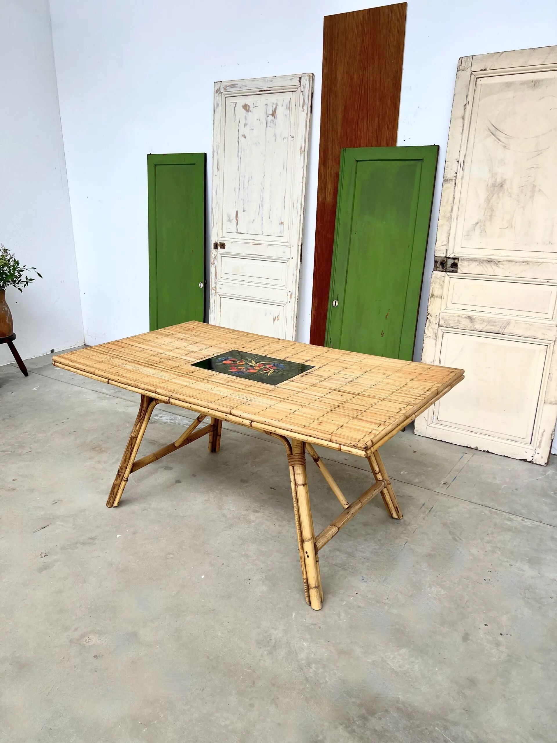 Audoux Minet bamboo rattan ceramic dining table, signed La Roue Vallauris