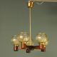 Scandinavian chandelier in mahogany wood and brass