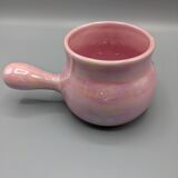 Iridescent pink frying pan, blue flower decoration