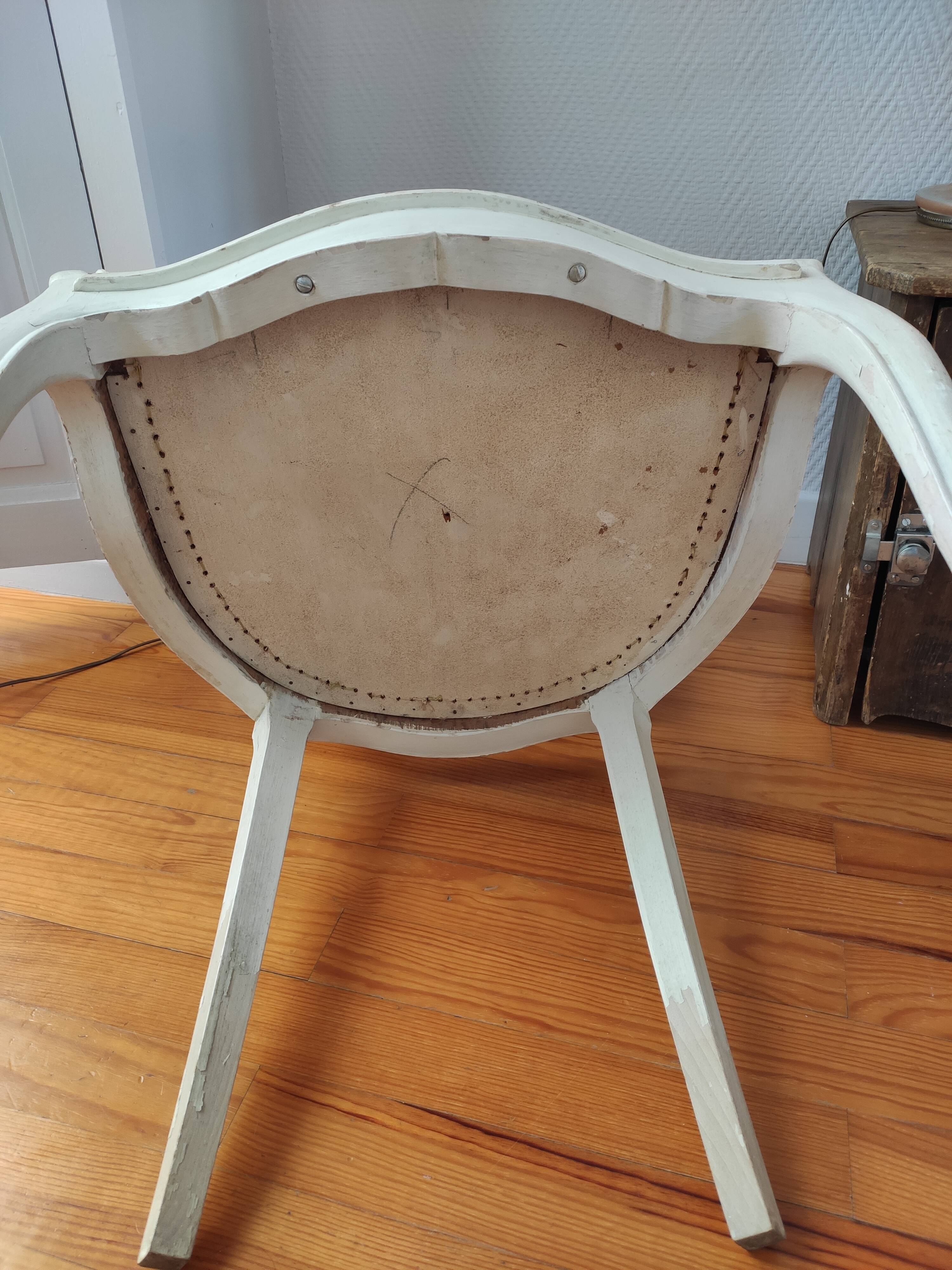 Pair of patinated armchairs