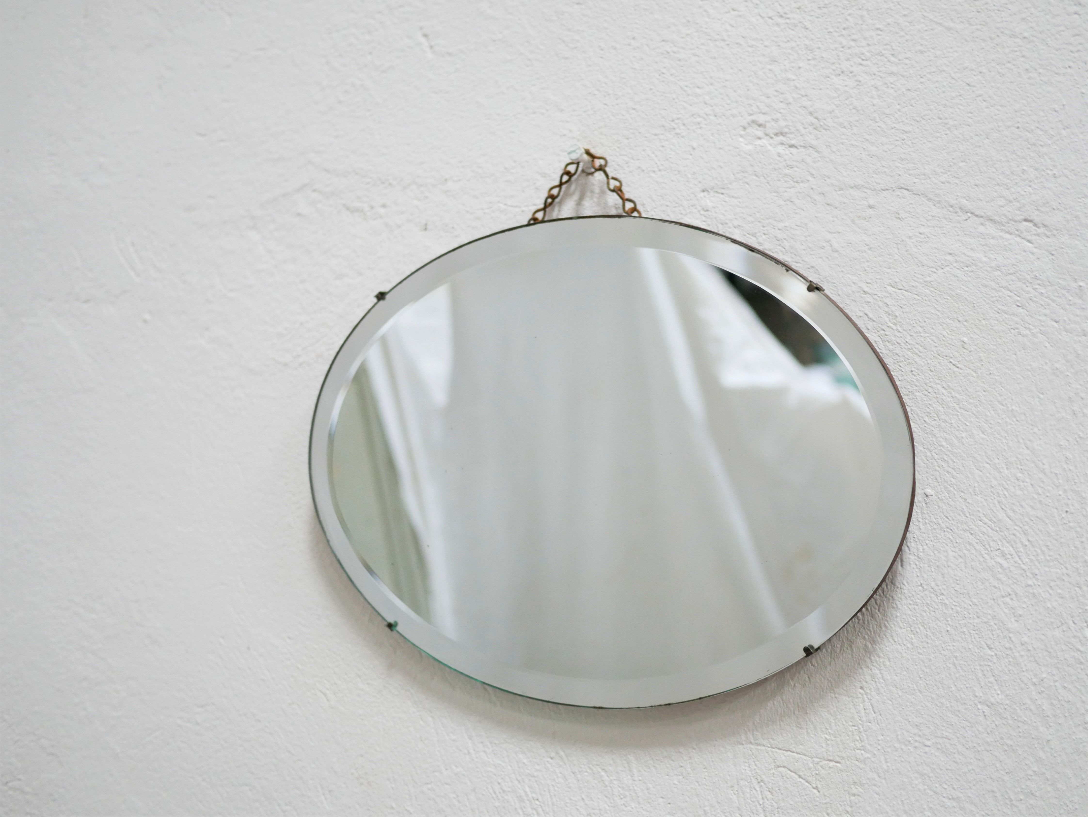 Vintage art deco bevelled oval mirror