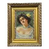 Portrait of a young woman. Signed Nevelli.