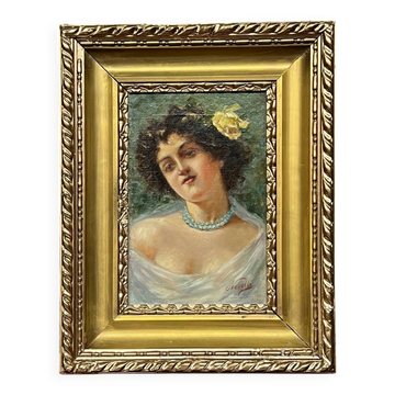 Portrait d'une jeune femme. Signé Nevelli.